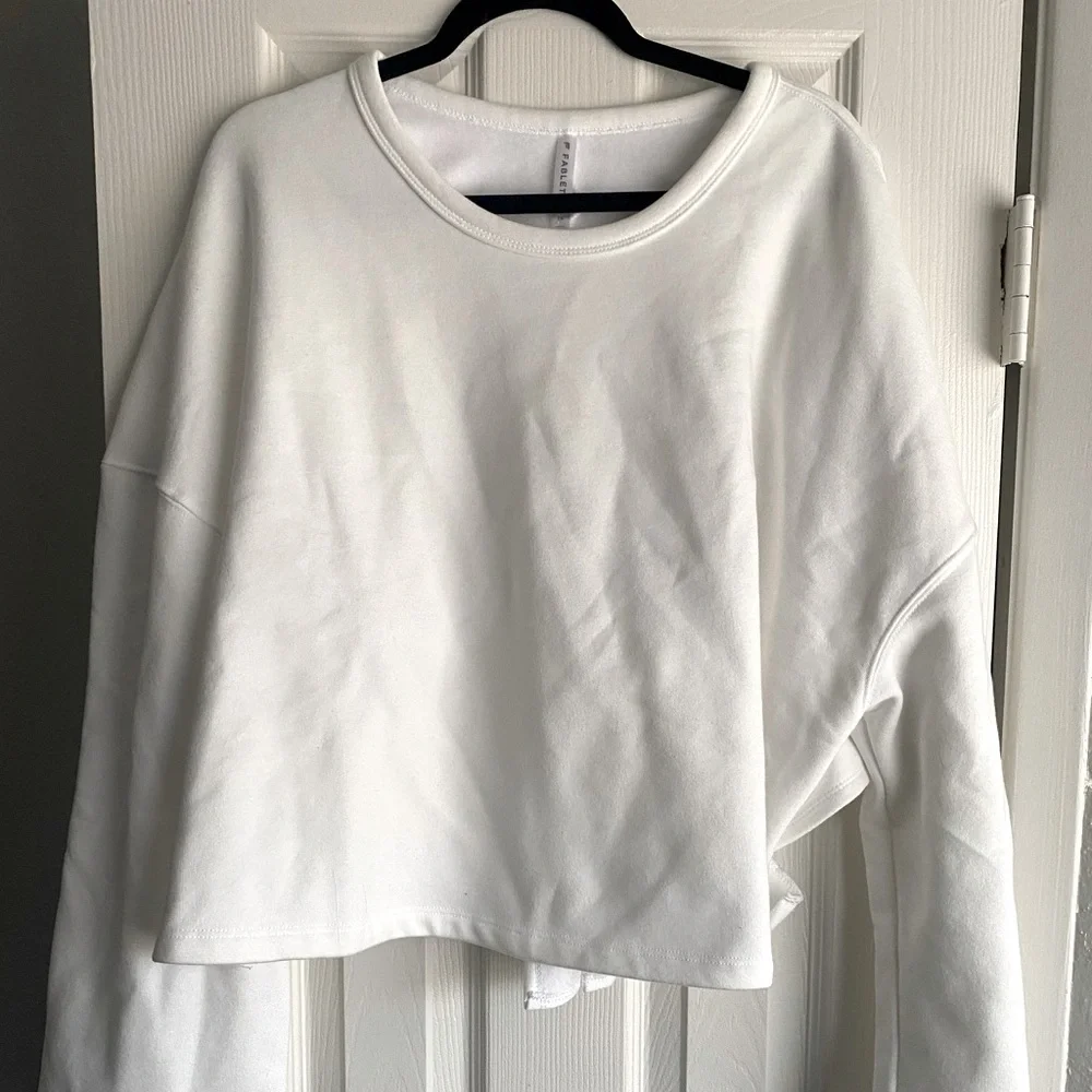 White Fabletics crew neck criss-cross tied back sweatshirt. Size L - Picture 1 of 5